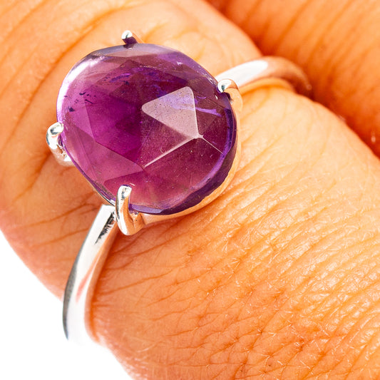 Amethyst faceted oval ring in .925 sterling silver, purple gemstone close-up