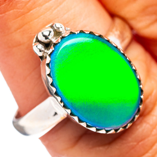 Sterling silver opal ring, size 7.25, oval green-blue cabochon with scalloped bezel