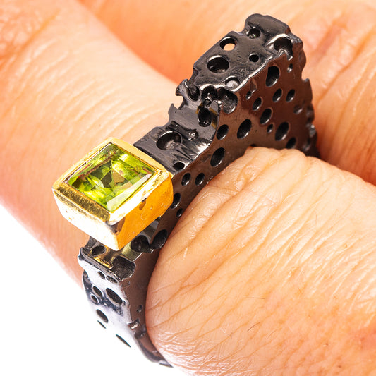 Black rhodium plated sterling silver ring with green peridot-style square stone
