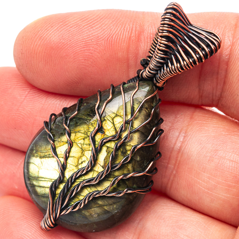 Labradorite tree of life pendant with oxidized copper wire frame, teardrop stone