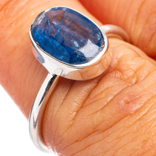 Sterling silver kyanite ring with oval blue stone, glossy bezel