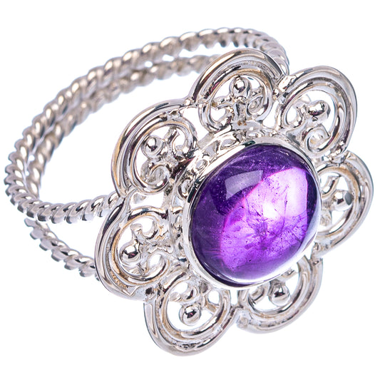 Twisted sterling silver amethyst ring with oval purple gemstone in detailed scroll setting