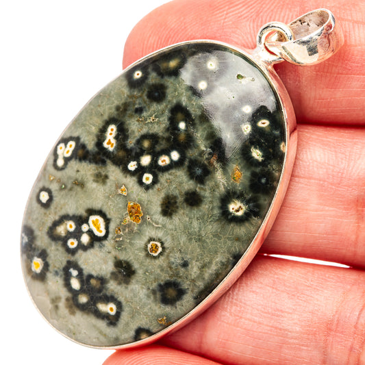 Oval ocean jasper pendant in .925 sterling silver, speckled floral pattern, silver bail