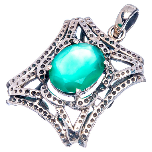 Sterling silver pendant with oval green onyx in ornate openwork setting