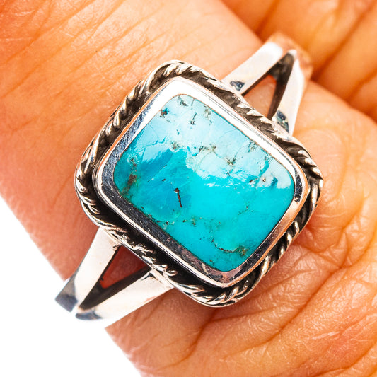 Sterling silver turquoise gemstone ring with rectangular bezel and rope border