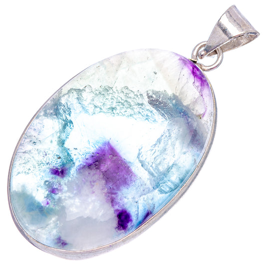 Fluorite pendant with oval silver-plated bezel, light blue and purple cabochon stone