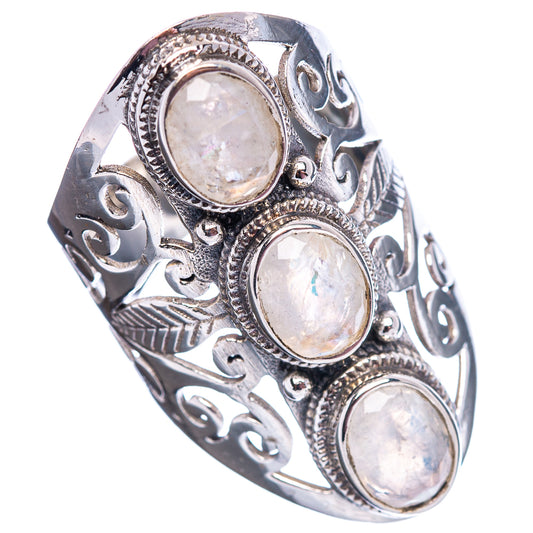 Sterling silver moonstone ring with three oval cabochons, detailed engraving, and scrollwork
