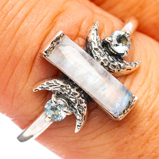 Sterling silver moonstone bar ring with blue topaz accents, ornate split shank