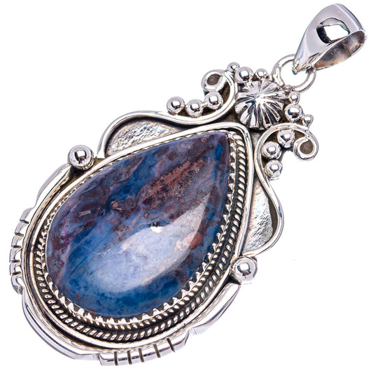 Sterling silver apatite pendant with blue teardrop cabochon, scalloped detailing and loop bail
