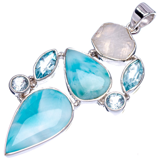 925 sterling silver pendant with blue pear and oval stones, plus clear round stones