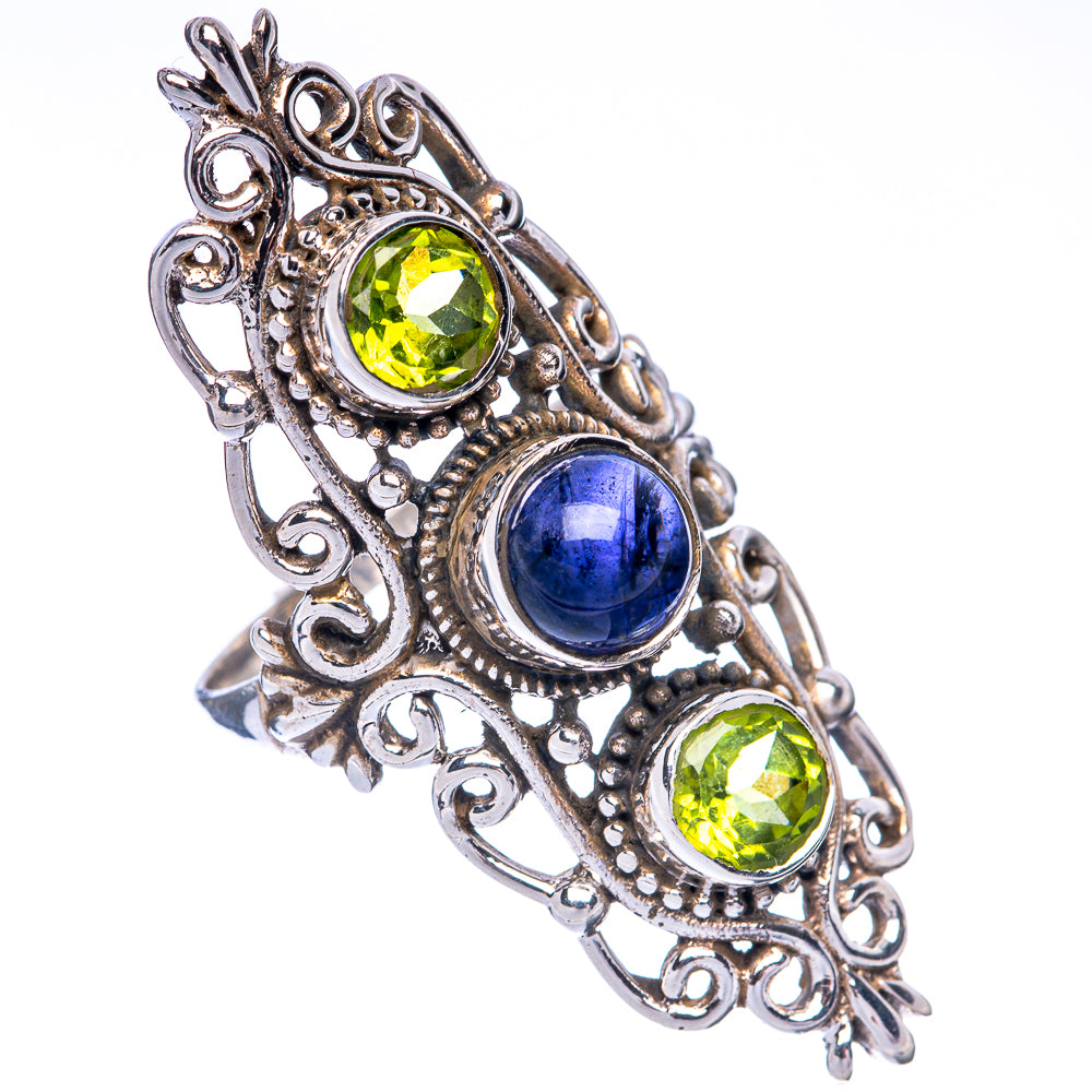 Sterling silver peridot and kyanite ring with three stones and decorative scrollwork