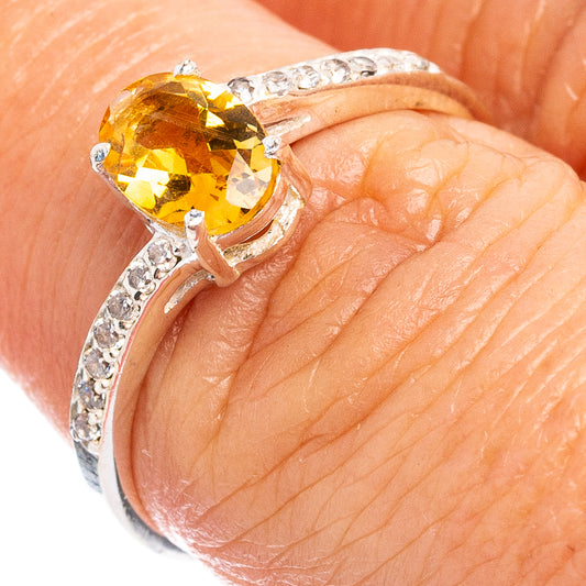 Citrine and cubic zirconia ring in .925 sterling silver on a finger