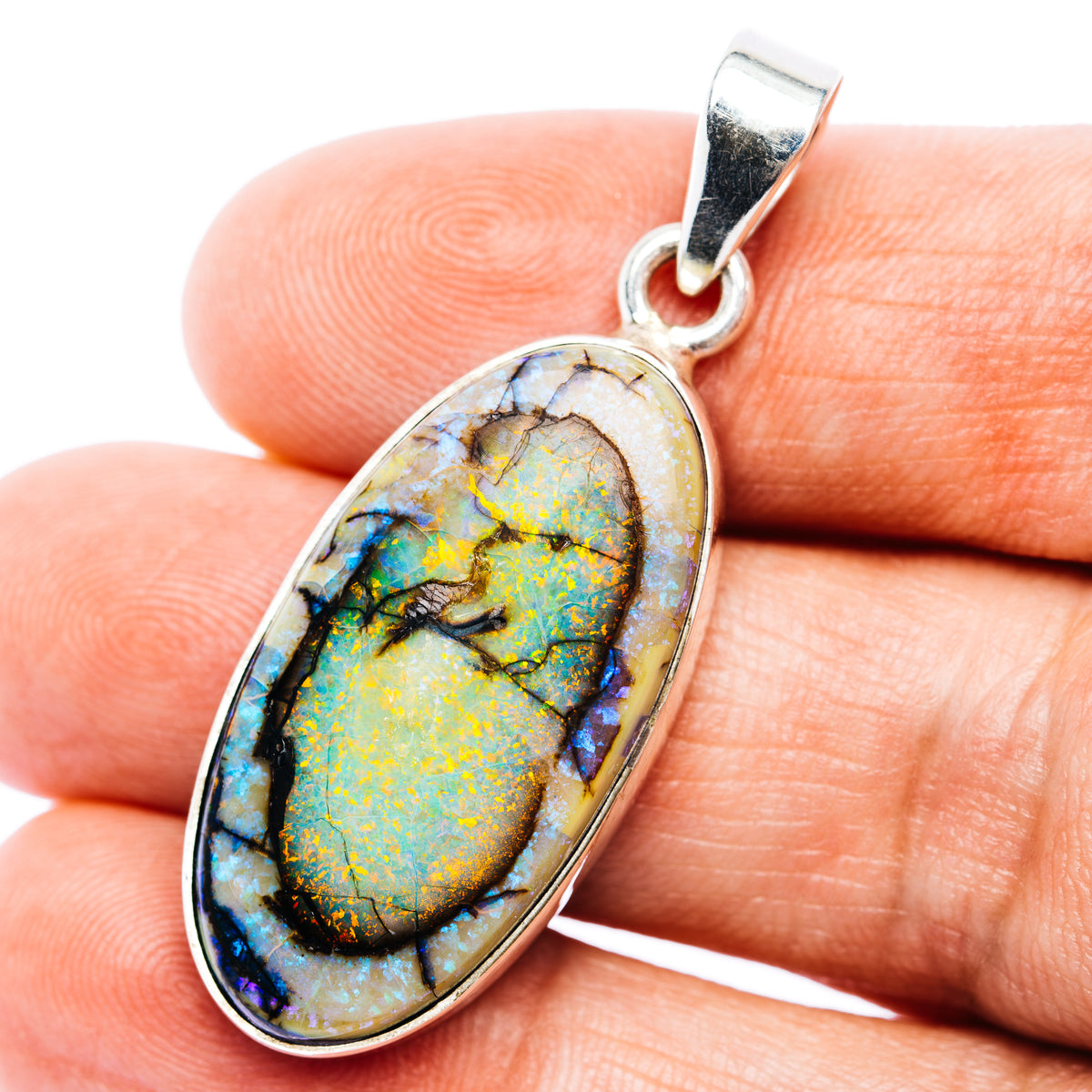 Oval .925 sterling silver opal pendant with colorful gemstone cabochon and bail