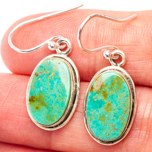 Turquoise oval sterling silver drop earrings with hinged hook and bezel setting