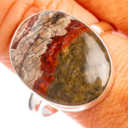 Sterling silver oval rhyolite ring with red, tan, and olive stone bezel