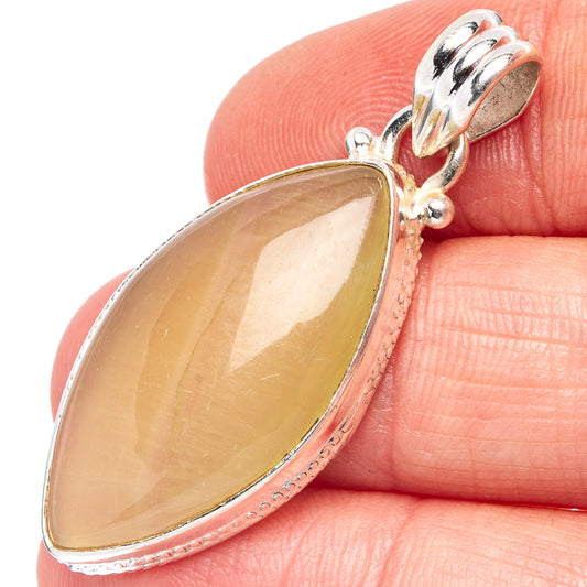 Prehnite pendant in .925 sterling silver, teardrop yellow-green gemstone close-up.