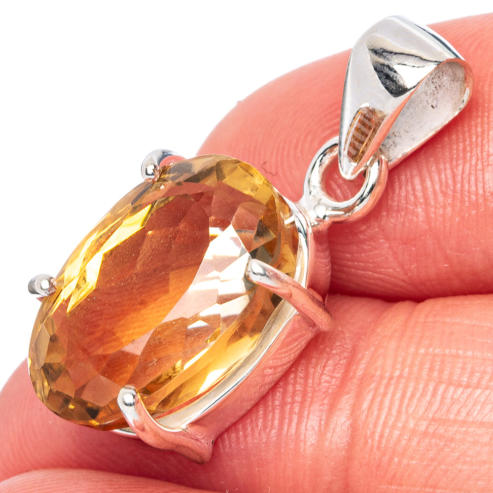 Sterling silver citrine pendant with large oval faceted gemstone and bail