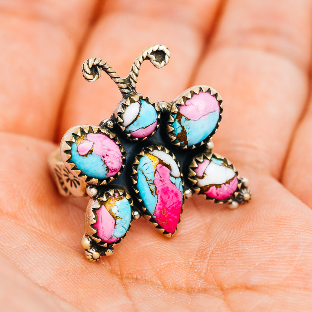 Southwestern butterfly ring with multicolor cabochon stones and blackened silver setting