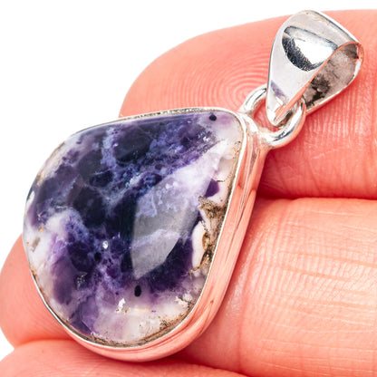 Oval purple opal sterling silver pendant with openwork bail, close-up on gemstone