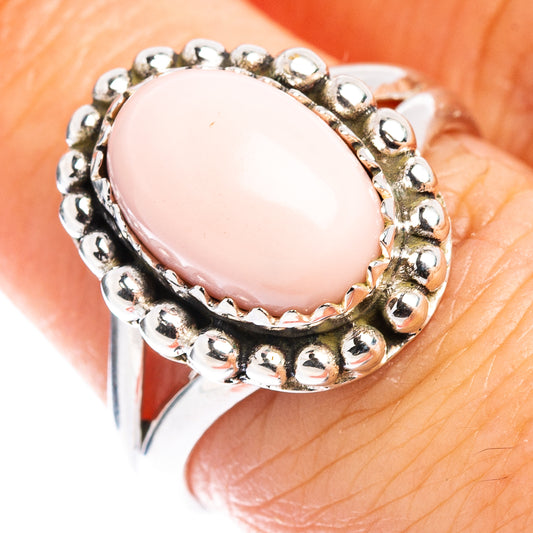 Pink opal oval cabochon sterling silver ring with beaded native-style bezel