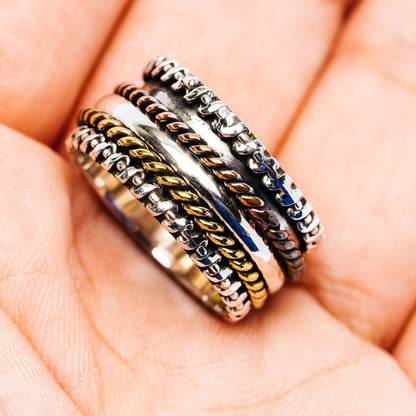 Multiband spinner ring, silver and gold-tone chain accents