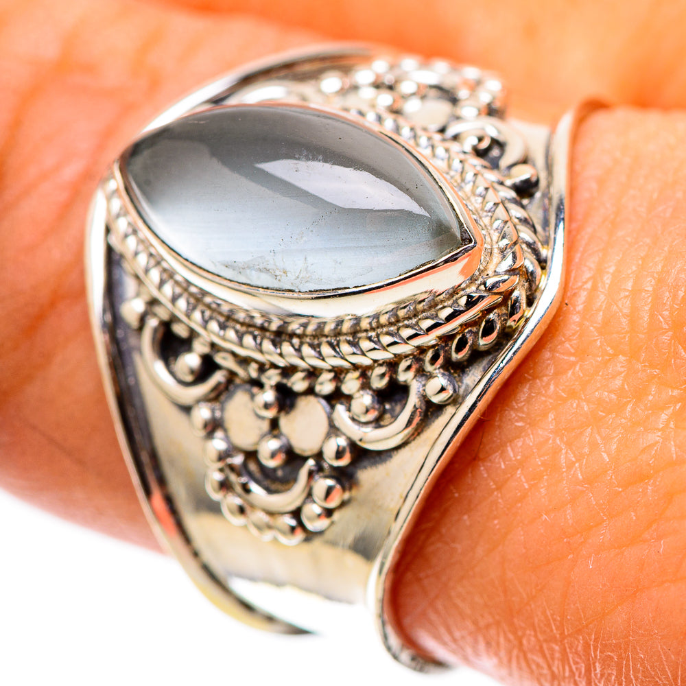 925 sterling silver ring with ornate filigree and light blue oval gemstone, size 9