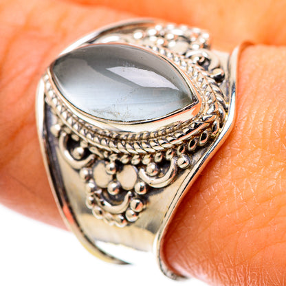 925 sterling silver ring with ornate filigree and light blue oval gemstone, size 9