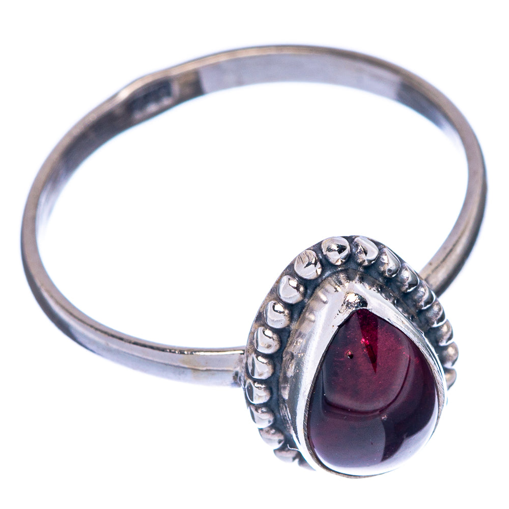 Garnet teardrop cocktail ring in 925 sterling silver, open angle view.