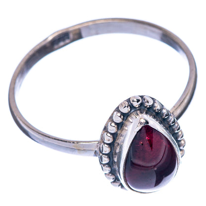 Garnet teardrop cocktail ring in 925 sterling silver, open angle view.