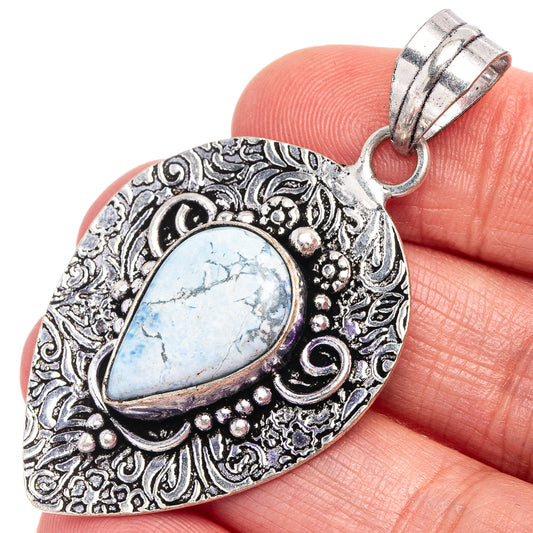 Silver-tone Larimar teardrop pendant with ornate filigree border and bail ring