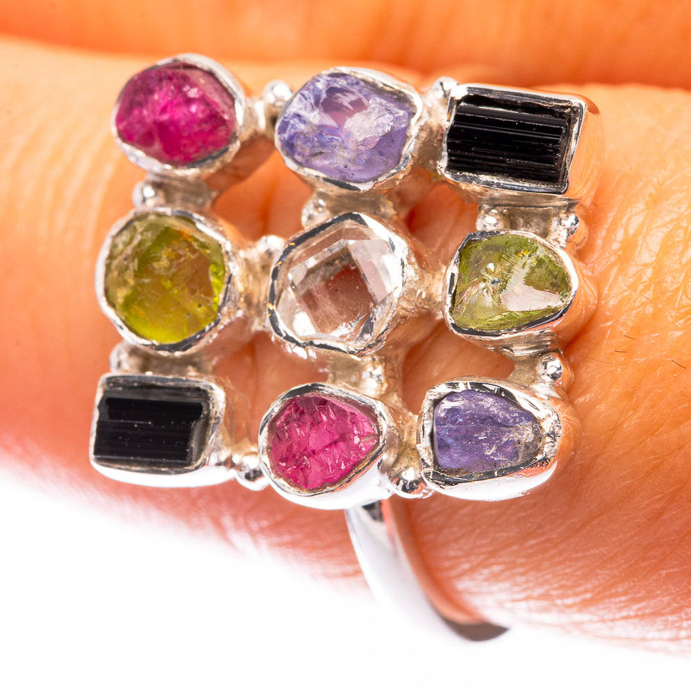 Raw tourmaline ring in silver with pink, purple, green, and clear stones