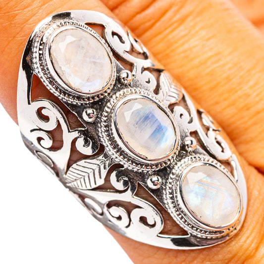 Sterling silver filigree ring with three oval rainbow moonstones and engraved band