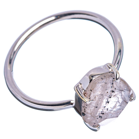 Sterling silver band ring with pear faceted stone in metal prongs, side view