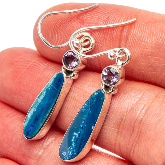 Sterling silver amethyst and blue opal drop earrings, close-up on hook and stones