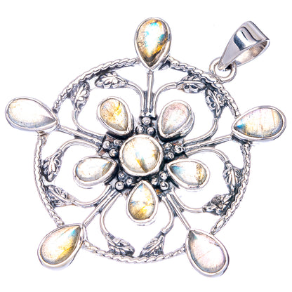 Sterling silver snowflake pendant with iridescent oval labradorite stones and bail