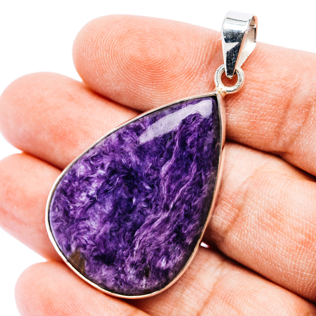 Teardrop charoite pendant with purple stone in .925 sterling silver bezel