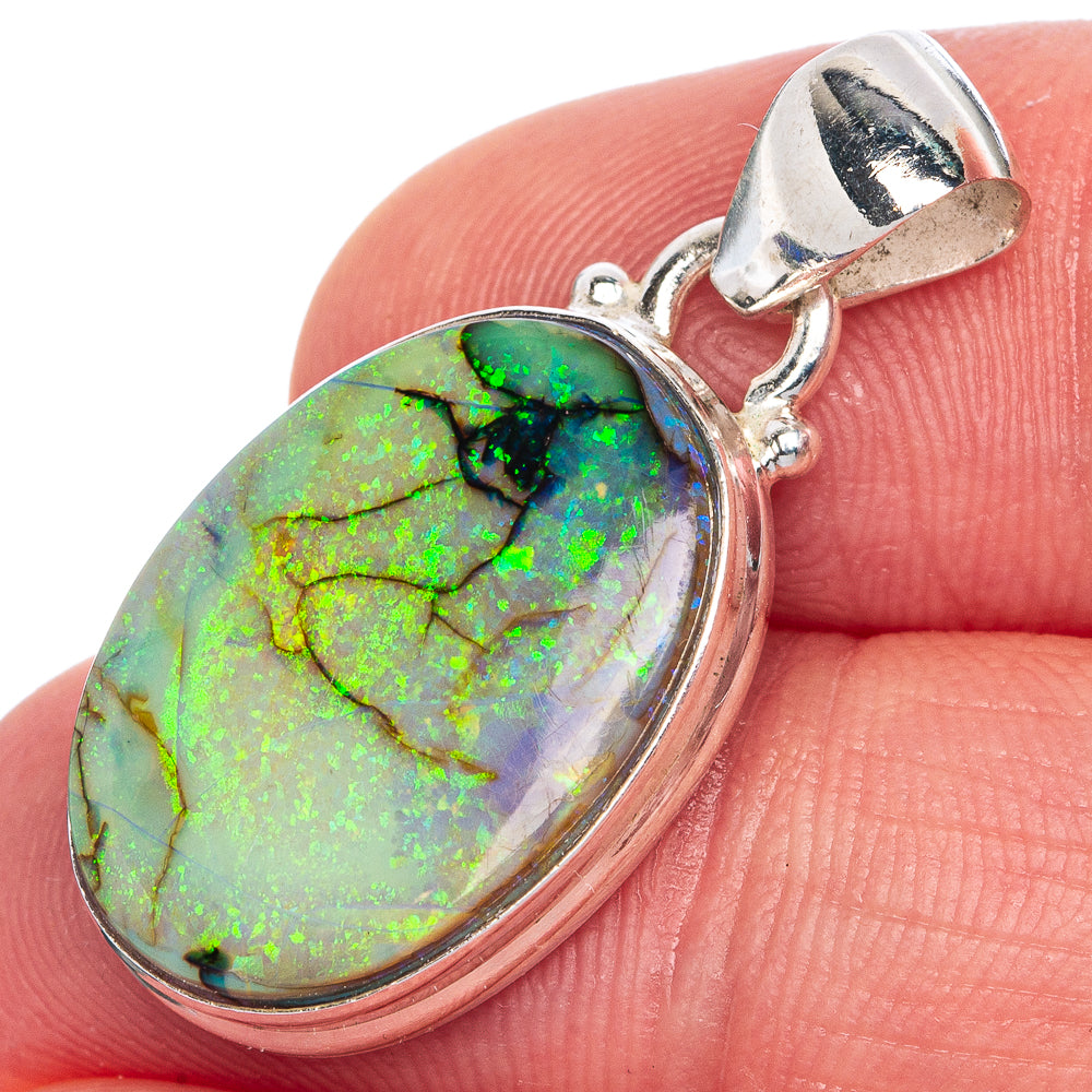 Sterling silver opal pendant with oval bezel, green and blue iridescent stone