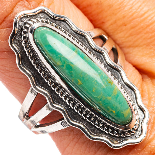 Turquoise oval stone sterling silver ring with scalloped bezel and rope detail
