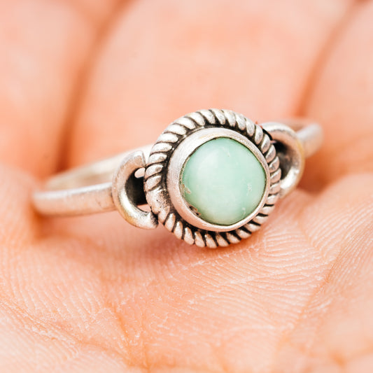 Turquoise cabochon sterling silver ring, rope bezel and openwork side details