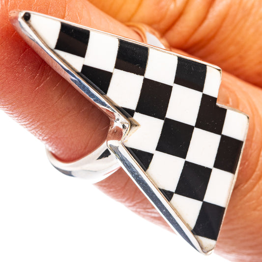 Sterling silver checkered onyx bolt ring, black and white checkerboard top, close view
