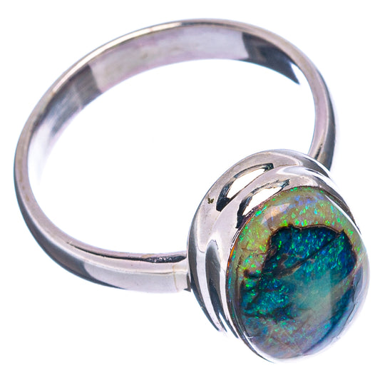 Oval green-blue opal set in a .925 sterling silver ring, side view, size 7