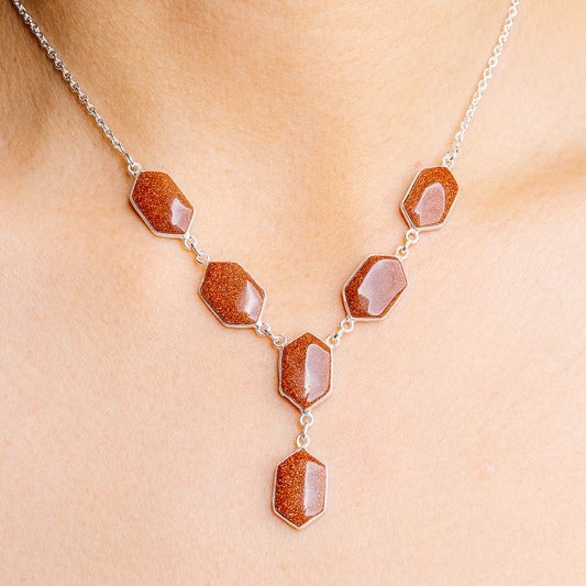 Sterling silver chain necklace with orange glitter hexagonal stones