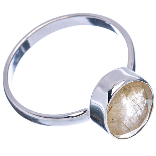 Sterling silver rutilated quartz ring with raised round stone, visible needle inclusions