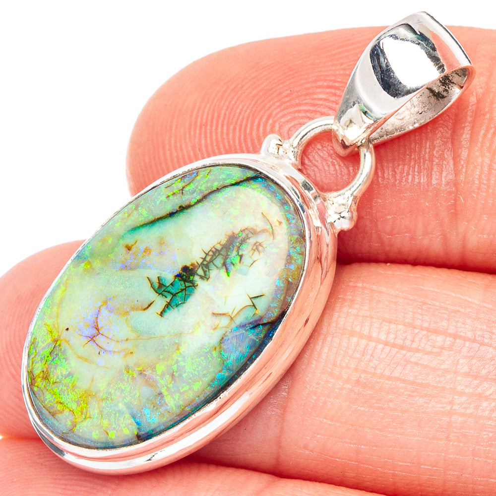 Sterling silver opal pendant with oval green-blue cabochon and polished bail