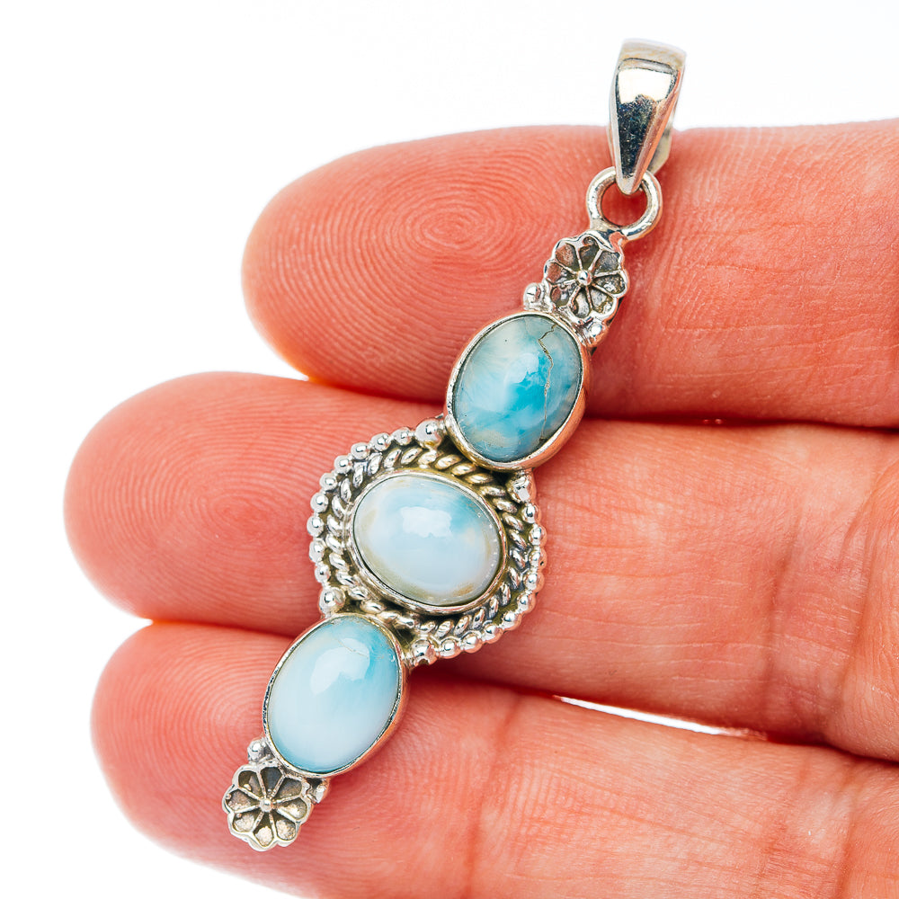 Sterling silver larimar pendant with three oval blue stones in ornate bezel