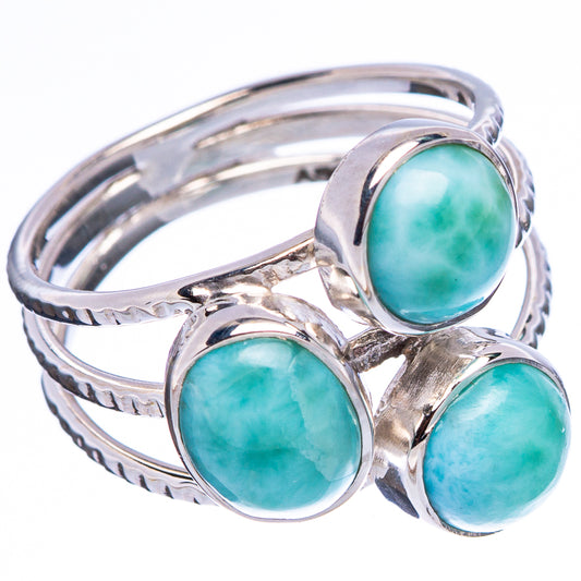 Sterling silver ring with three oval larimar cabochons on ridged band, side view
