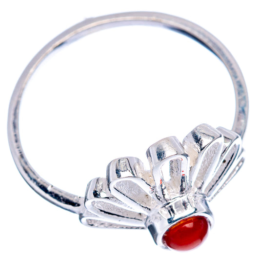 Sterling silver daisy ring with red cabochon, side view on the band.