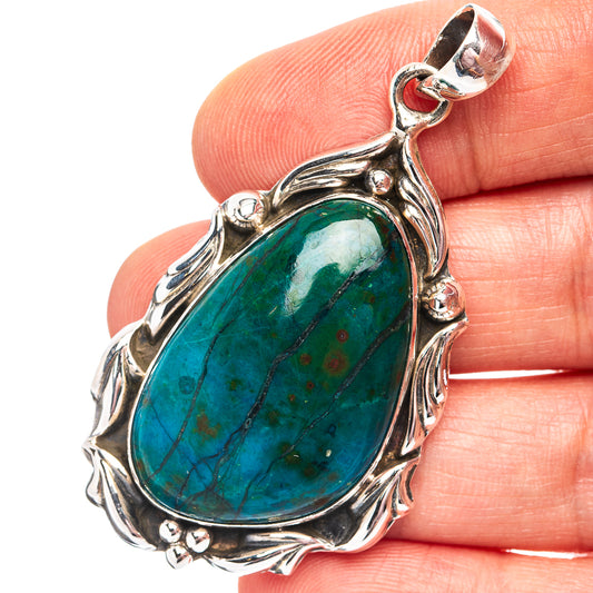925 sterling silver pendant with oval chrysocolla gemstone, ornate bezel