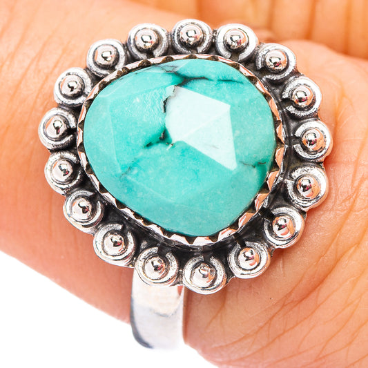 Sterling silver turquoise gemstone ring with ornate bead-like bezel
