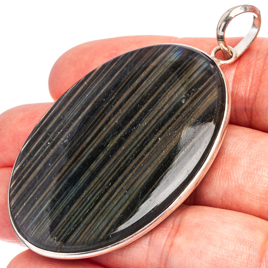 Silver-plated oval labradorite pendant with loop bail, dark striped cabochon face